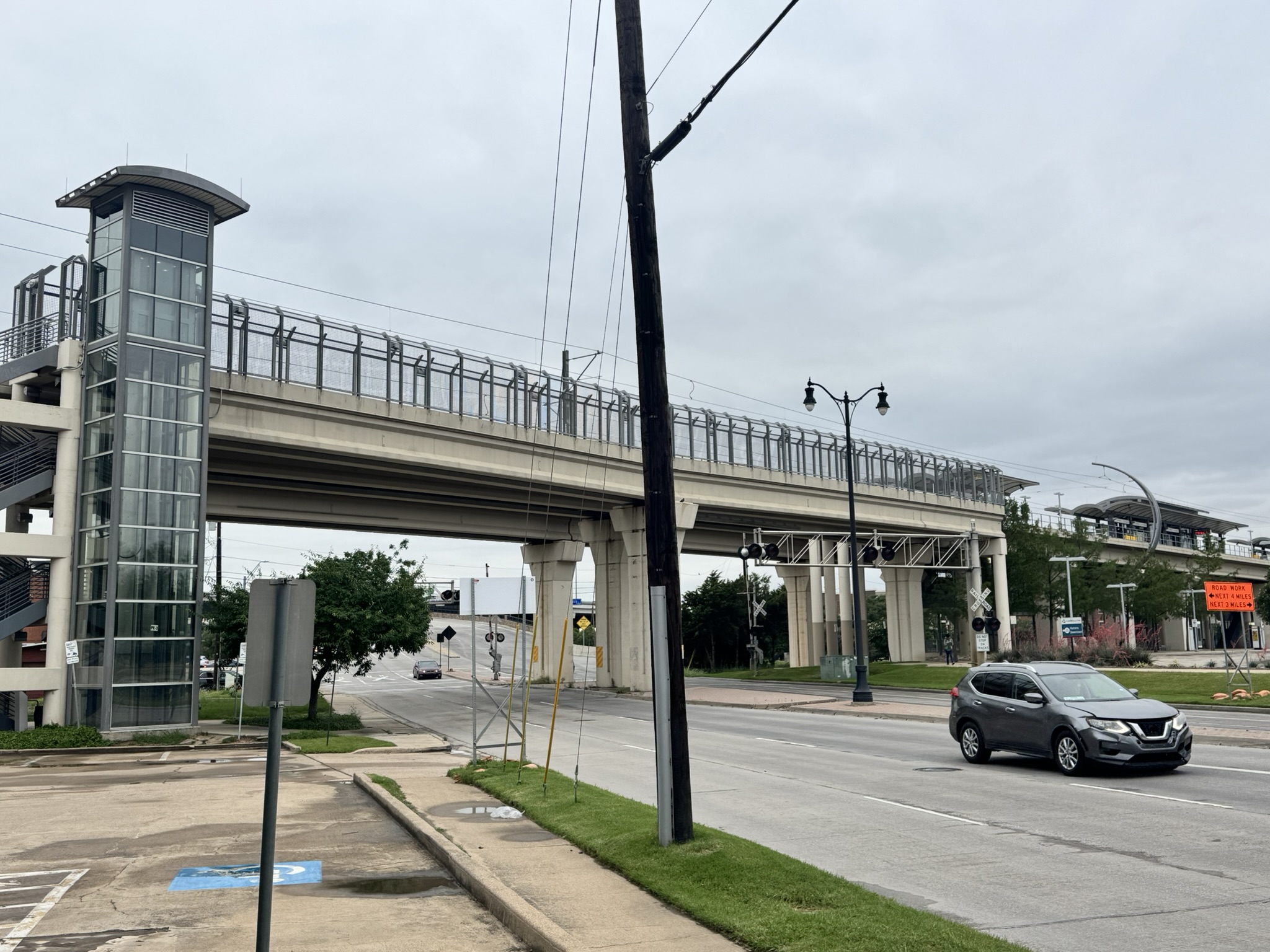 DART Green Line station beside the building's parking lot